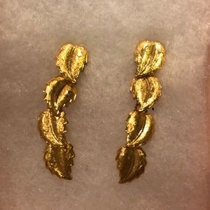 Hanging pierced gold earrings